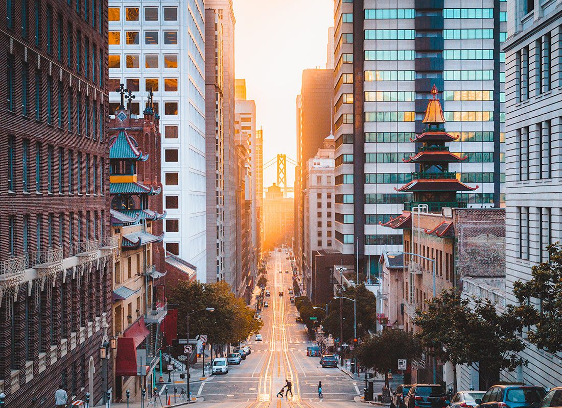 Contact - San Francisco With a View of a California Downhill Street at Sunrise